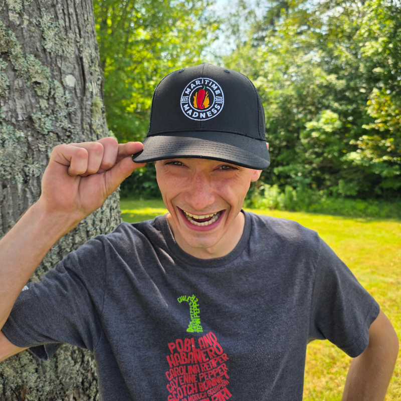 The Badge Trucker Hat