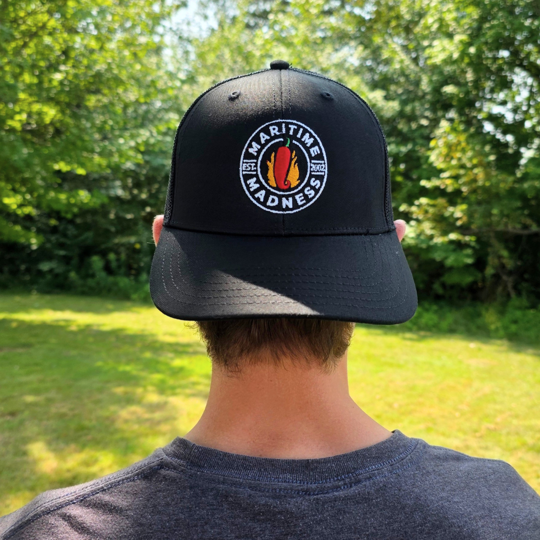 The Badge Trucker Hat